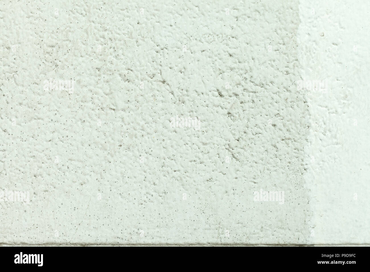 Mur blanc en stuc ou la texture d'arrière-plan Banque D'Images