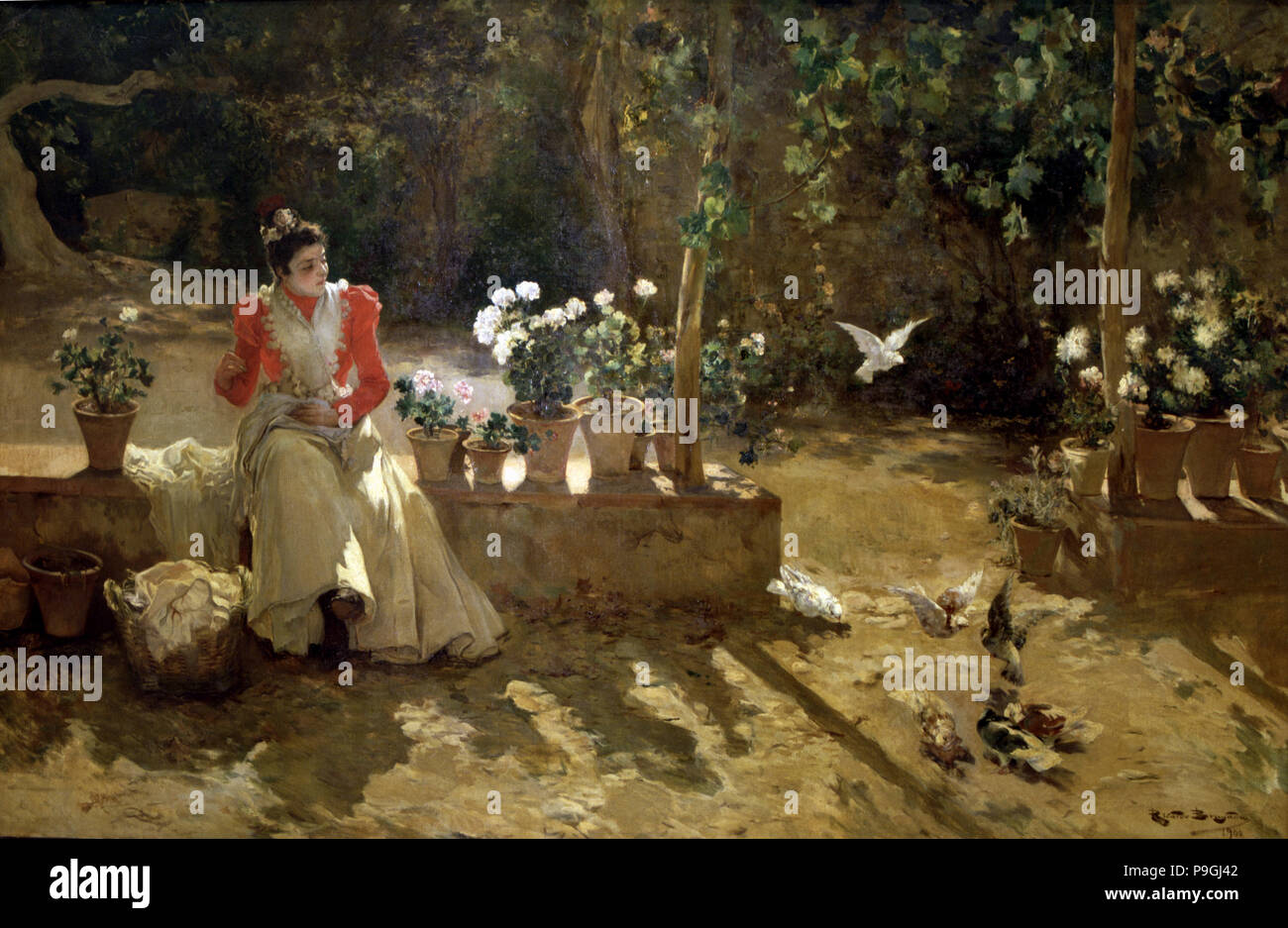 'Girl' avec des pigeons, huile, 1900 Ricardo Brugada. Banque D'Images