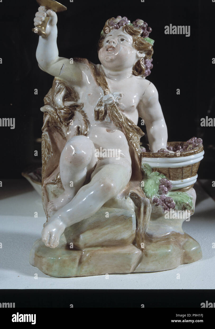 Bacchus, le dieu grec du vin, de la céramique, figurine faite dans le vrai Fábrica del Buen Retiro, en 1775. Banque D'Images