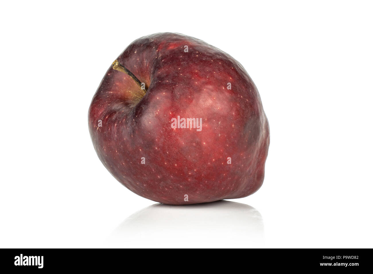 Une pomme Red Delicious isolé sur fond blanc Banque D'Images