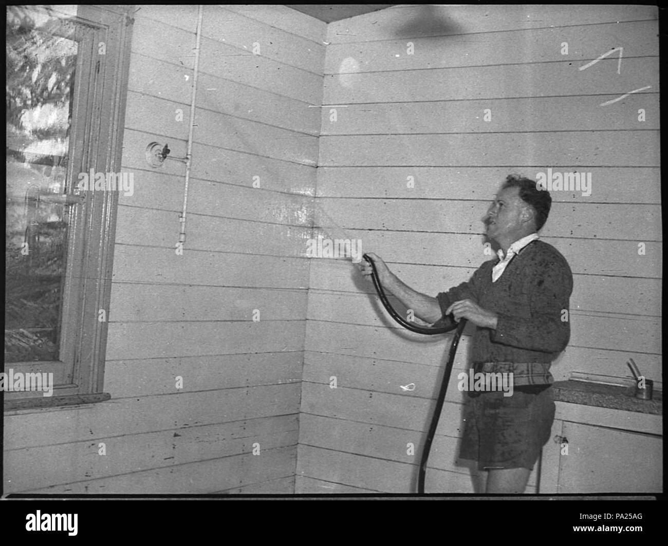 31233 SLNSW 256 Maitland inondations M. J. Marriott par jet sa maison dans la rue Wallace Banque D'Images