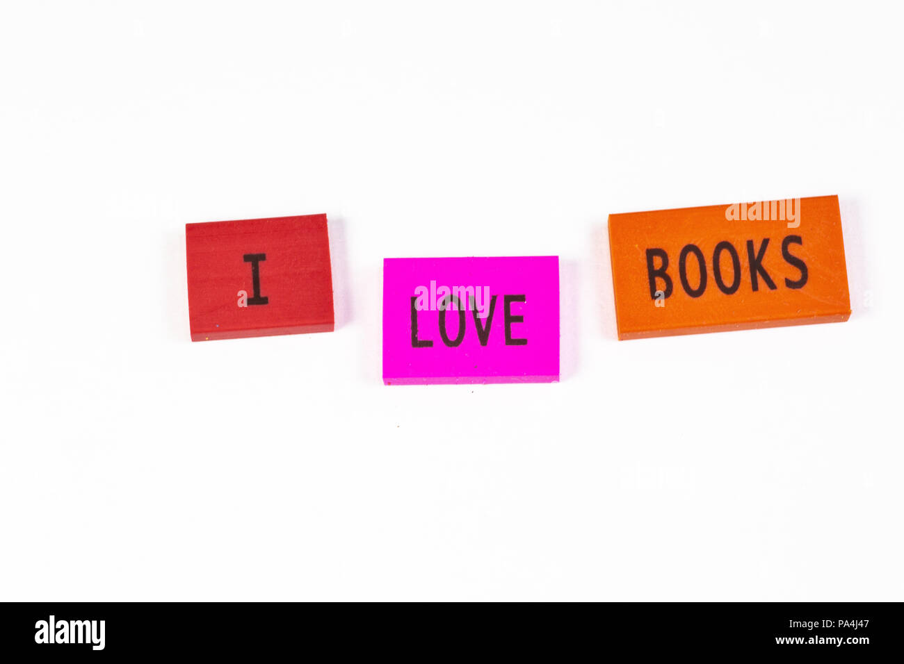 La joie de la première journée d'école exprimé en blocs, J'aime les livres. Banque D'Images