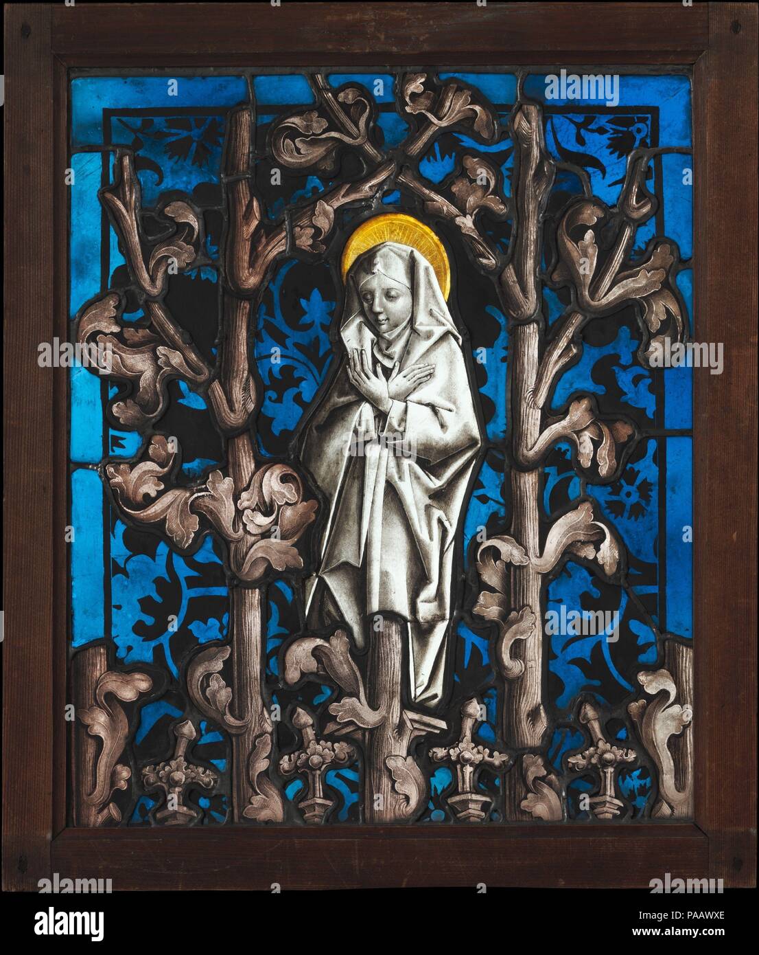 La Mater Dolorosa. Artiste : Lautenbach Master (allemand, actif fin du 15e siècle) ; Cercle de Peter Hemmel d'Andlau (von) Werkstattgemeinschaft Strassburger (active le Sud et le centre de l'Allemagne, ca. 1470-1500). Culture : l'allemand. Dimensions : 19 5/8 x 16 3/8 in. (49,8 x 41,6 cm). Date : ca. 1480. Deuil du Christ mère (mater dolorosa) peuplements dans un luxuriant réseau de branches feuillues connu comme Astwerk, une traduction d'auvents et d'architecture à remplages un vocabulaire végétal. Parmi les artistes les plus novateurs de la fin du xve siècle, Peter Hemmel et le groupe de peintres stainedglass Banque D'Images