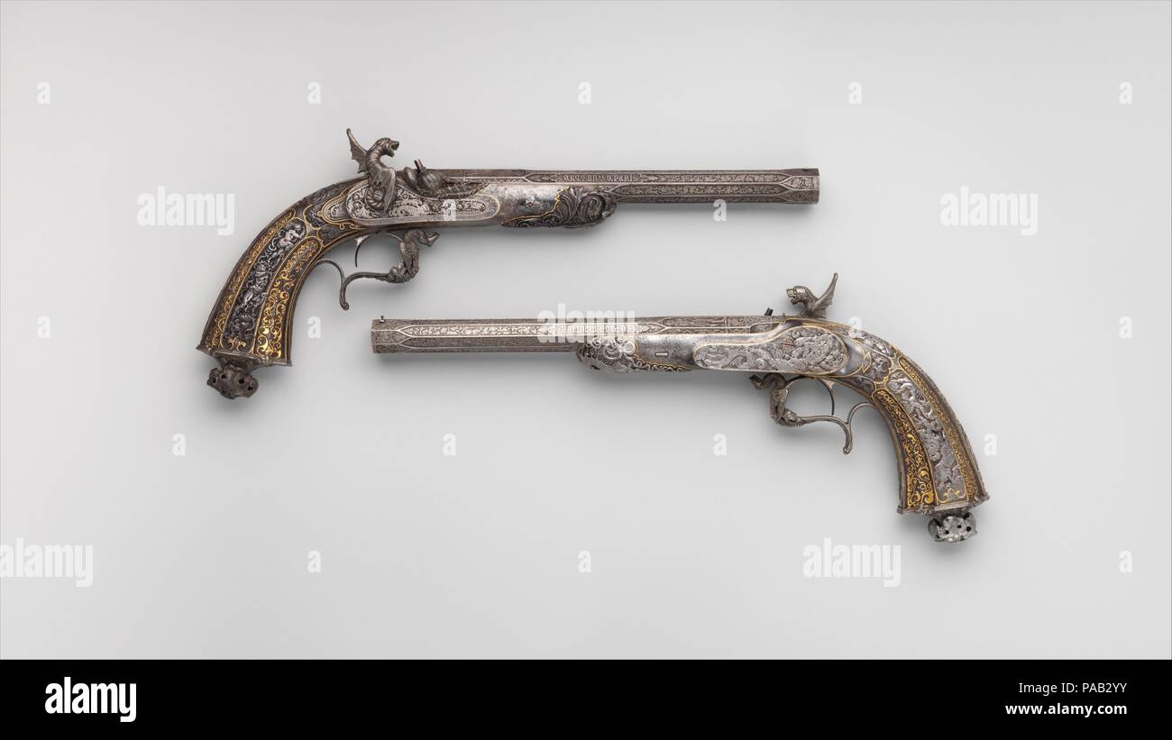 Deux pistolets à percussion Exposition. Barrelsmith : barils par Léopold Bernard (français, Paris, active 1832-70). Culture : le français. Décorateur : Décoré par Antoine Vechte (Français, 1799-1868). Dimensions : 2013.514.1 : L. 16 in. (40,7 cm) ; L. de baril 10 1/4 in. (26,1 cm) ; Cal. .45 dans. (11,4 mm) ; 2013.514.2 : L. 15 7/8 in. (40,3 cm) ; L. de baril 10 1/4 in. (26,0 cm) ; Cal. .46 dans. (11,7 mm). Armurier : signé par Gilles Michel Louis Moutier-Le Page (français, 1810-1887). Date : du 1849 et 1851. Commandé par le célèbre cabinet d'gunmaking Paris Le Page, ce sont les seuls pistolets connus exécutée par un Banque D'Images