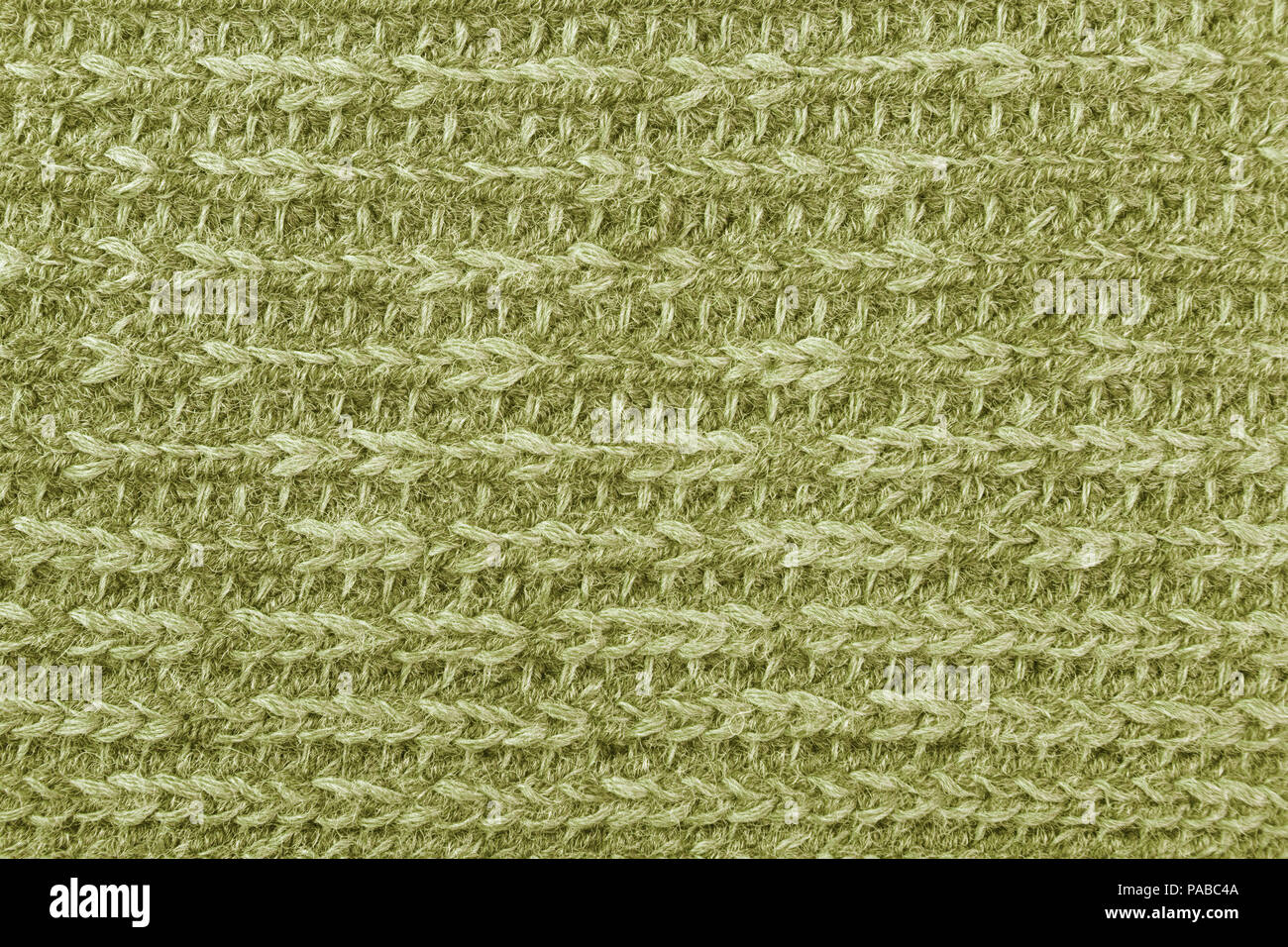 Gros pulls tricotés closeup texture jaune Banque D'Images