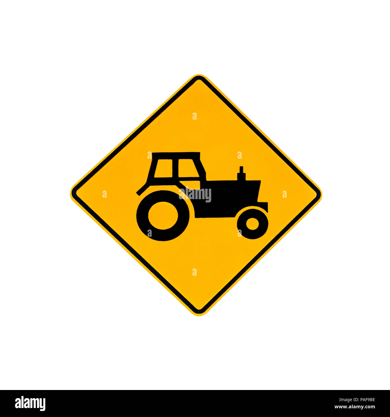 Trafic routier australien avertissement signe de tracteurs sur la route et de la voirie de l'Australie. Isolé sur blanc. Banque D'Images
