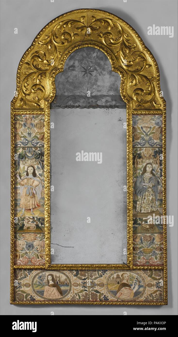 Miroir. Culture : British. Dimensions : H. 59 x 31 1/2 pouces (151,1 W. x  78,7 cm). Date : troisième trimestre du 17ème siècle. Représentations  stylisées du roi et de la reine