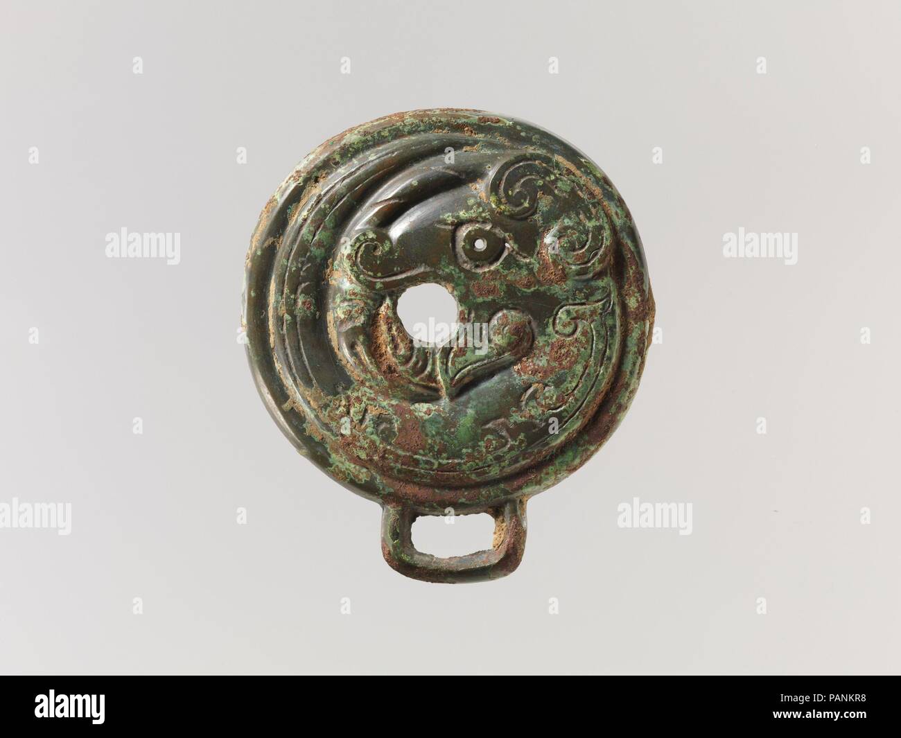 Bridle Cheekpiece. Culture : la Chine. Dimensions : H. 3 13/16 in. (9,7 cm) ; W. 3 5/16 in. (8,4 cm). Date : 11ème-10ème siècle avant J.-C.. Musée : Metropolitan Museum of Art, New York, USA. Banque D'Images