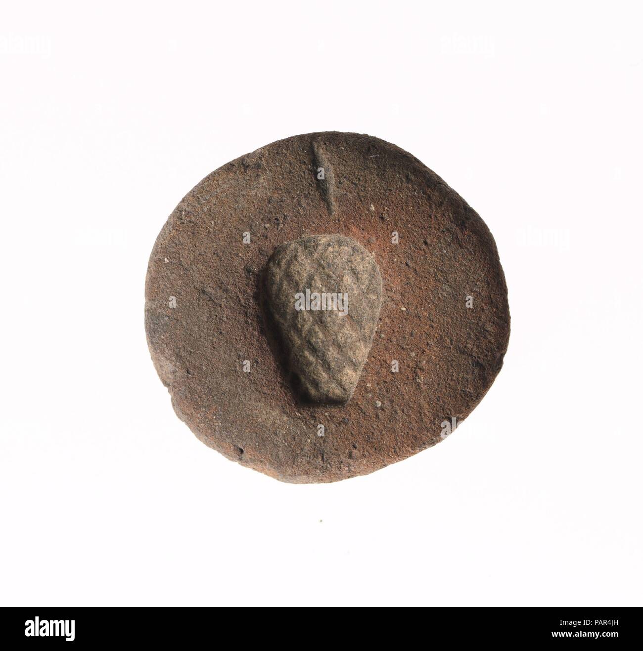 Moule pour ombelle de drap pendentif. Dimensions : L. 2.5 cm (1 in.). Dynastie DYNASTIE : 18. Règne : règne d'Akhenaton. Date : ca. 1353-1336 av. J.-C.. Musée : Metropolitan Museum of Art, New York, USA. Banque D'Images