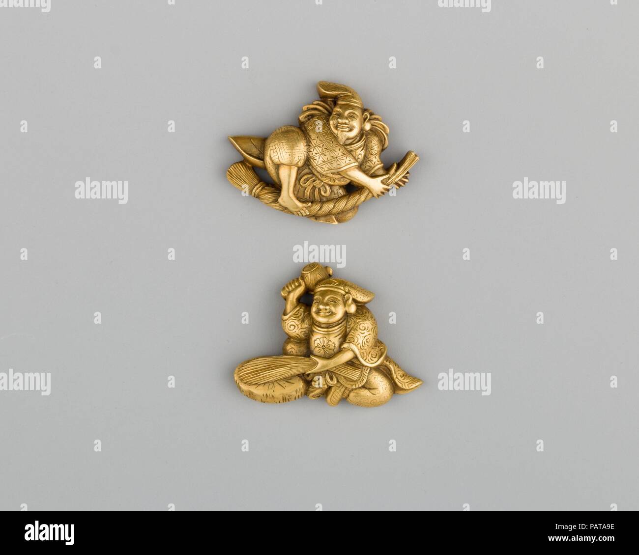 Paire d'ornements d'Sword-Grip (Menuki). Culture : le japonais. Dimensions : L. de chaque 1. (2,5 cm) ; Wt. de chaque 0,2 oz. (5.7 g). Date : le 18e siècle. Musée : Metropolitan Museum of Art, New York, USA. Banque D'Images