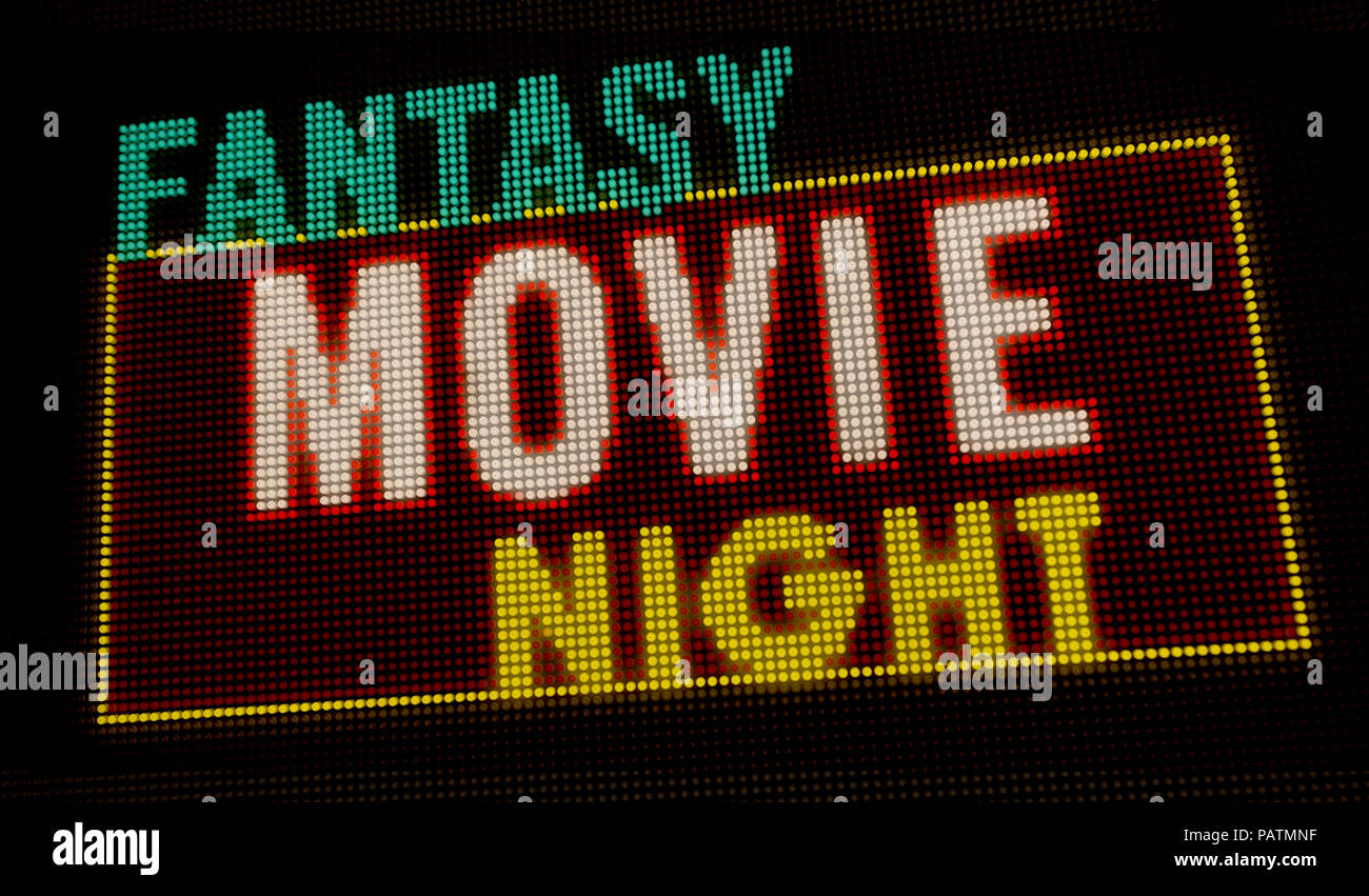 Fantasy film rétro éclairé de nuit intro lettres néon sur grand écran avec de grands pixels. La lumière vive du texte sur l'affichage des ampoules. Événement de divertissement adv Banque D'Images