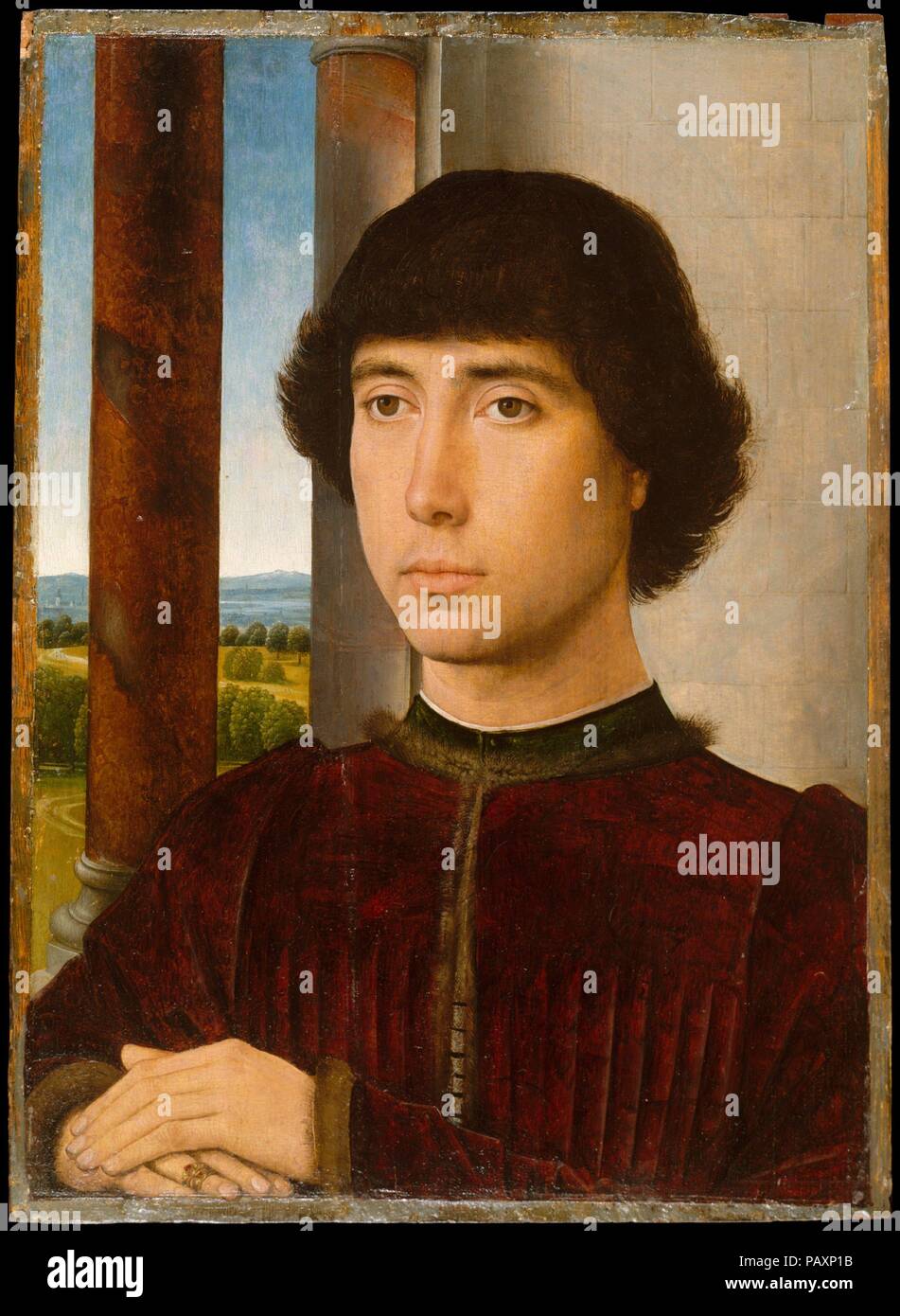 Portrait d'un jeune homme. Artiste : Hans Memling (, Russisch, Seligenstadt par Actif 1465 - 1494 Bruges). Dimensions : Hors tout 15 3/4 x 11 3/8 in. (40 x 29 cm) ; surface peinte 15 1/8 x 10 3/4 in. (38,3 x 27,3 cm). Date : ca. 1472-75. L'un des plus recherchés après portrait Russisch peintres de son temps, Memling's attention méticuleuse aux détails est remarquable dans le naturalisme remarquable de la gardienne de faciès et la texture de son velours, garni de fourrure tunique. Le jeune homme était probablement l'un des nombreux visiteurs de Florentine, ou résidents de, Bruges, dont plusieurs portraits commandés Banque D'Images