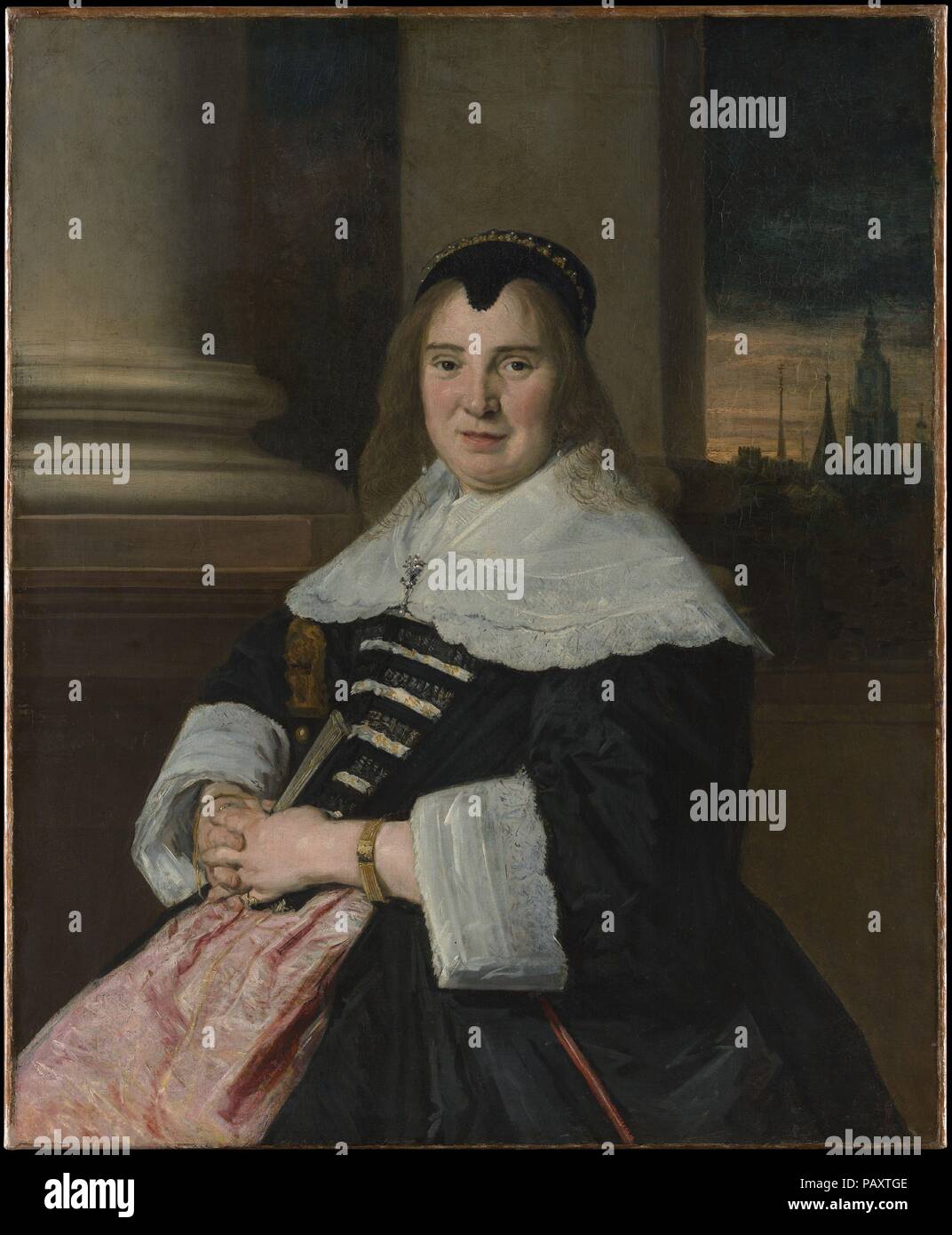 Portrait d'une femme. Artiste : Frans Hals (Anvers 1582/83-1666 Néerlandais, Haarlem). Dimensions : 39 3/8 x 32 1/4 in. (100 x 81,9 cm). Date : ca. 1650, 18e siècle probablement retravaillé. La photo date d'environ 1650 et avait à l'origine un fond neutre, comme dans le Marquand  <i >Portrait d'un homme </i > (91,26.9). Dans les années 1660 ou plus tard, le travail a été modernisée par la peinture de l'arrière-plan ; l'architecture monumentale, en particulier, est indifférent à la figure est amical regard et naturel. La surface de la peinture est usé et a été écrasé par une doublure. Musée : Metropolitan Museum of Art, New York, USA. Banque D'Images