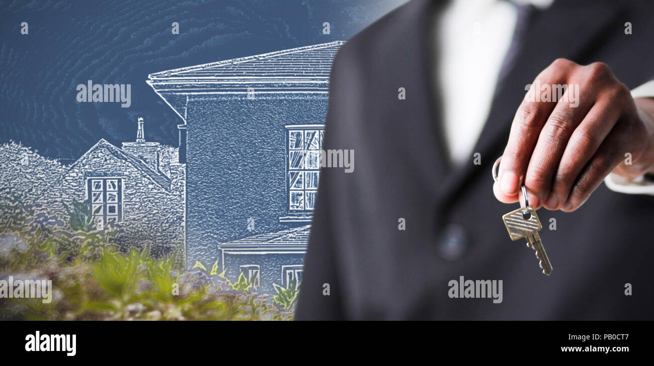 Composite image of a businessman holding a key Banque D'Images