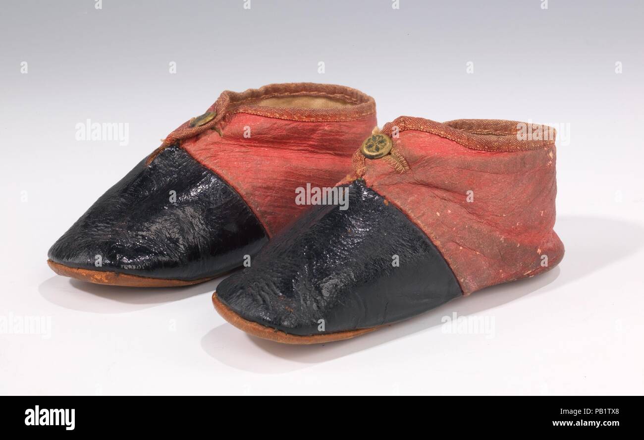 Des chaussures. Culture : L'Américain. Date : ca. 1860. L'association du  noir et rose ou marron et rose est souvent vu dans les souliers du début au  milieu du 19e siècle. Bien