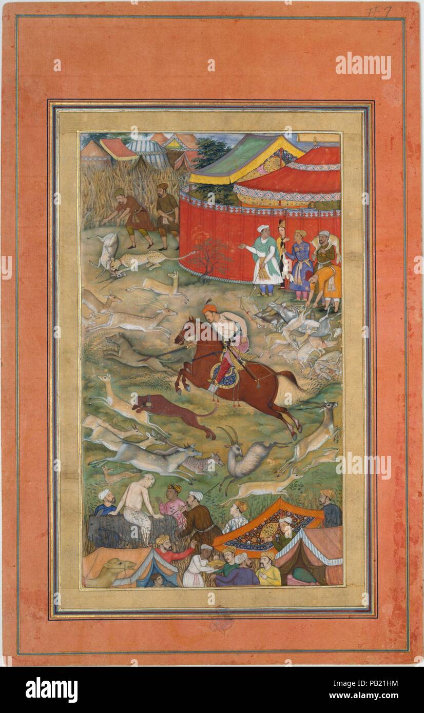 'Hamid Bhakari puni par Akbar', folio d'un Akbarnama. Artiste : peinture attribuée à Manohar (active ca. 1582-1624). Auteur : Abu'l Fazl (1551-1602). Dimensions : Page : H. 13 1/8 in. (33,3 cm) W. 8 1/4 in. (21 cm) mat : H. 19 1/4 in. (48,9 cm) 14 1/4 in. W. (36,2 cm). Date : ca. 1604. Écrit par le courtisan Abu'l Fazl entre 1589 et 1598, l'Akbarnama raconte la vie de l'empereur Akbar, y compris des détails sur les affaires de Sa Majesté, allant de l'émission de décrets pour son alimentation quotidienne. L'objectif de ce tableau semble être une expédition de chasse royale, mais le maïs en bas à gauche Banque D'Images