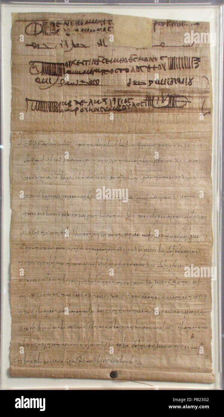 Papyrus. Culture : le copte. Dimensions : hors tout : 25 x 14 3/8 à 13/16. (65,5 x 36,5 cm) Encadré : 27 1/2 x 16 1/8 x 1 3/16 in. (69,9 x 40,9 x 3 cm). Date : 698. Musée : Metropolitan Museum of Art, New York, USA. Banque D'Images