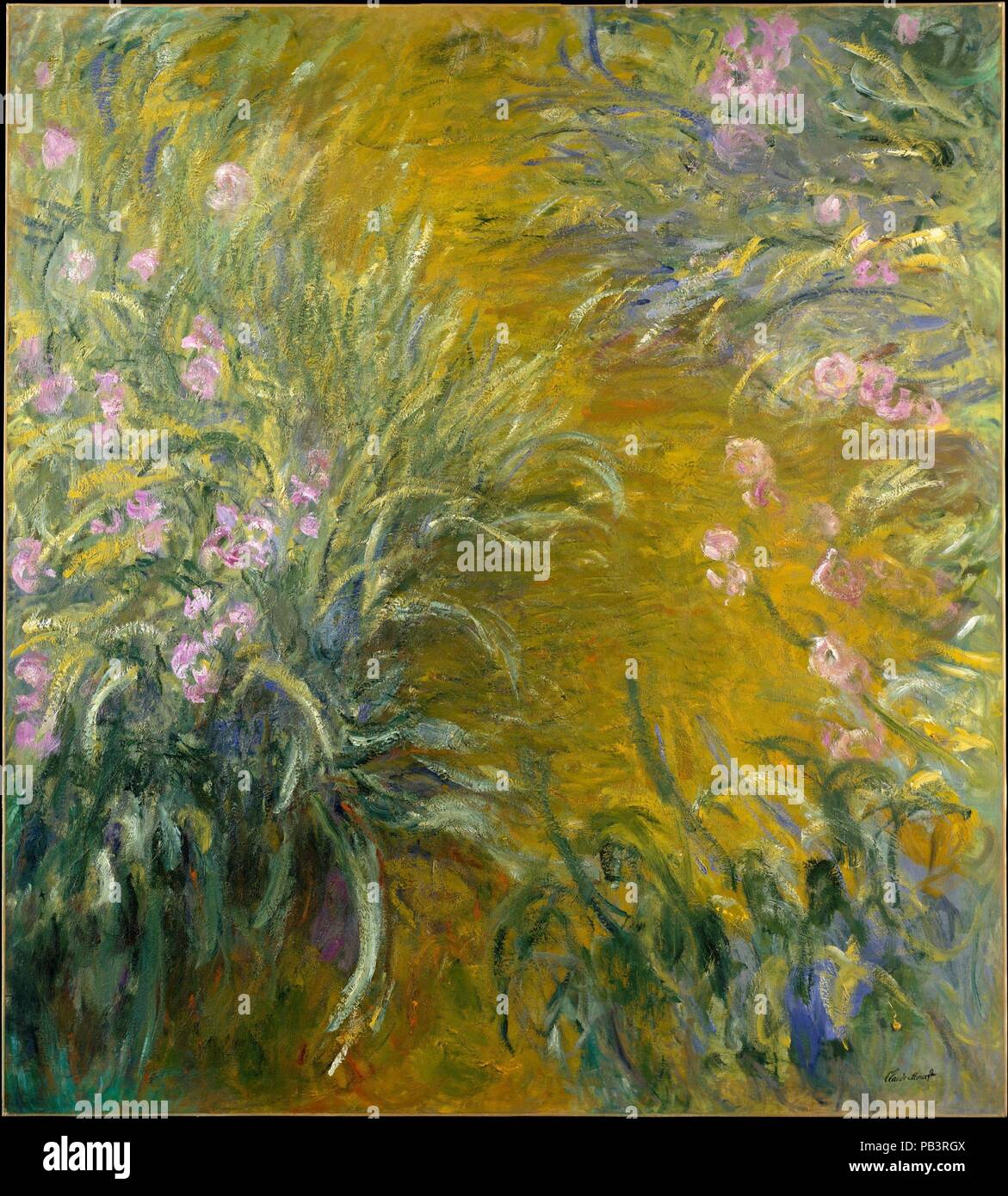 Le chemin à travers l'iris. Artiste : Claude Monet (français, Paris 1906-1957 Giverny). Dimensions : 78 7/8 x 70 7/8 in. (200,3 x 180 cm). Date : 1914-17. Iris, parmi les fleurs préférées de Monet, alignés le long des allées jusqu'à la Chambre et le pont japonais sur la propriété de l'artiste à Giverny. Cette vue d'un sentier appartient à une série d'œuvres monumentales peintes pendant la Première Guerre mondiale qui capture l'essence vitale de ces fleurs avec l'intensité et l'ampleur de la vision. À la fin de sa vie, comme sa vue a faibli, il a dispensé avec subtilité et 'a pris dans le motif en grandes masses,' wa Banque D'Images