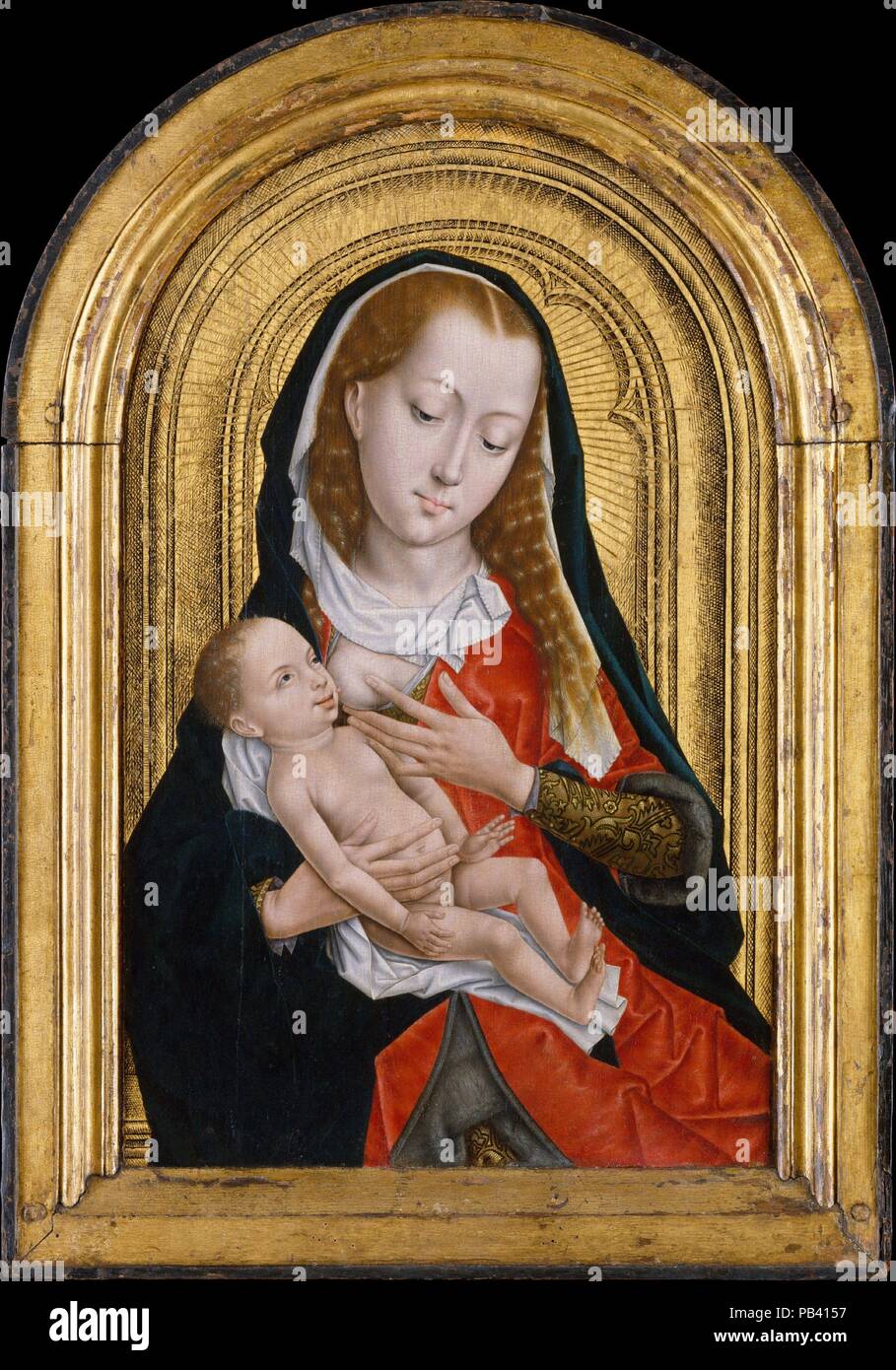 Vierge à l'enfant. Artiste : Maître de la légende de Saint Ursula Russisch, active (fin xve siècle). Dimensions : haut voûtée, 22 1/8 x 13 1/2 in. (56,2 x 34,3 cm). Date : 1475-99. Les images de dévotion de l'allaitement, la Vierge Virgo lactans  <i > </i >, est devenu extrêmement populaire dans la peinture du xve siècle, en particulier à Bruges, où l'Sint-Donaaskerk abrité des reliques de Mary's hair et le lait. Bien que le motif en général découle d'une icône byzantine type ( <i >galaktotrophousa </i >), la Vierge et l'enfant dans cette image ont été cités de Rogier van der Weyden's  <i >Saint Luc dessinant la Vierge </i Banque D'Images