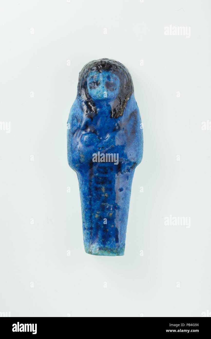 Shabti travailleur de Nany. Dimensions : H. 8,6 × 3,3 × D. W. 2.1 cm (3 3/8 x 1 5/16 × 13/16 in.). Dynastie DYNASTIE : 21. Règne : règne de Psusennes I. Date : ca. C.-B. 1050. Voir 30.3.27.1a, b. Musée : Metropolitan Museum of Art, New York, USA. Banque D'Images