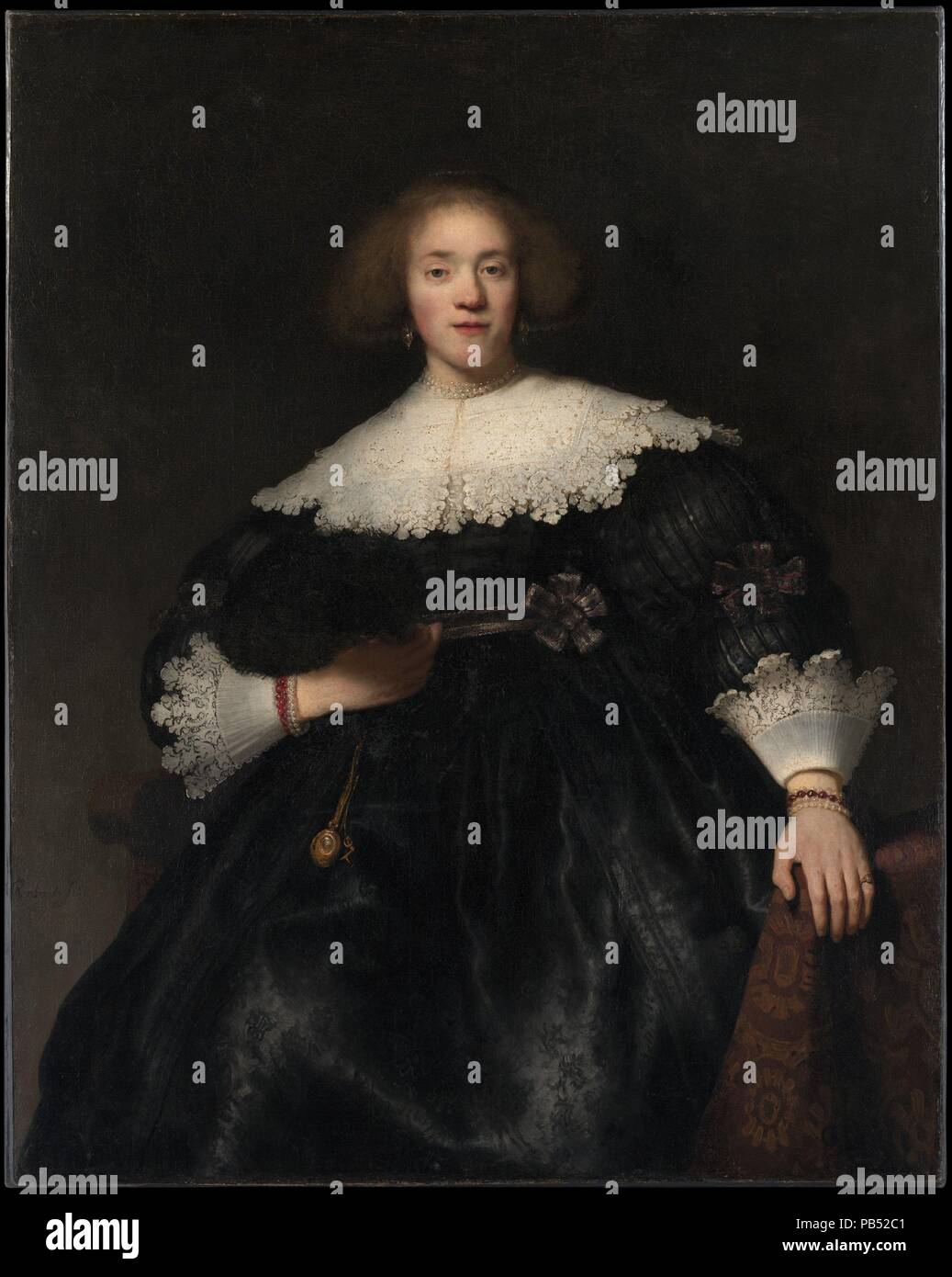 Portrait d'une jeune femme avec un ventilateur. Artiste : Rembrandt Rembrandt (van Rijn) (Néerlandais, Leyde 1606-1669 Amsterdam). Dimensions : 49 1/2 x 39 3/4 in. (125,7 x 101 cm). Date : 1633. Ce portrait a animé un pendentif montrant la gardienne ou du mari se levant d'une chaise (Taft Museum, Cincinnati). Quand vus ensemble, mari et femme semblent répondre à l'autre, ce qui rend ces parmi les plus inventifs de Rembrandt compositions du début des années 1630. Au début de Rembrandt expérience de peintre d'histoire dramatique des scènes et son étude minutieuse de physionomie et caractère au cours du temps, il a passé à Leyde préparé h Banque D'Images