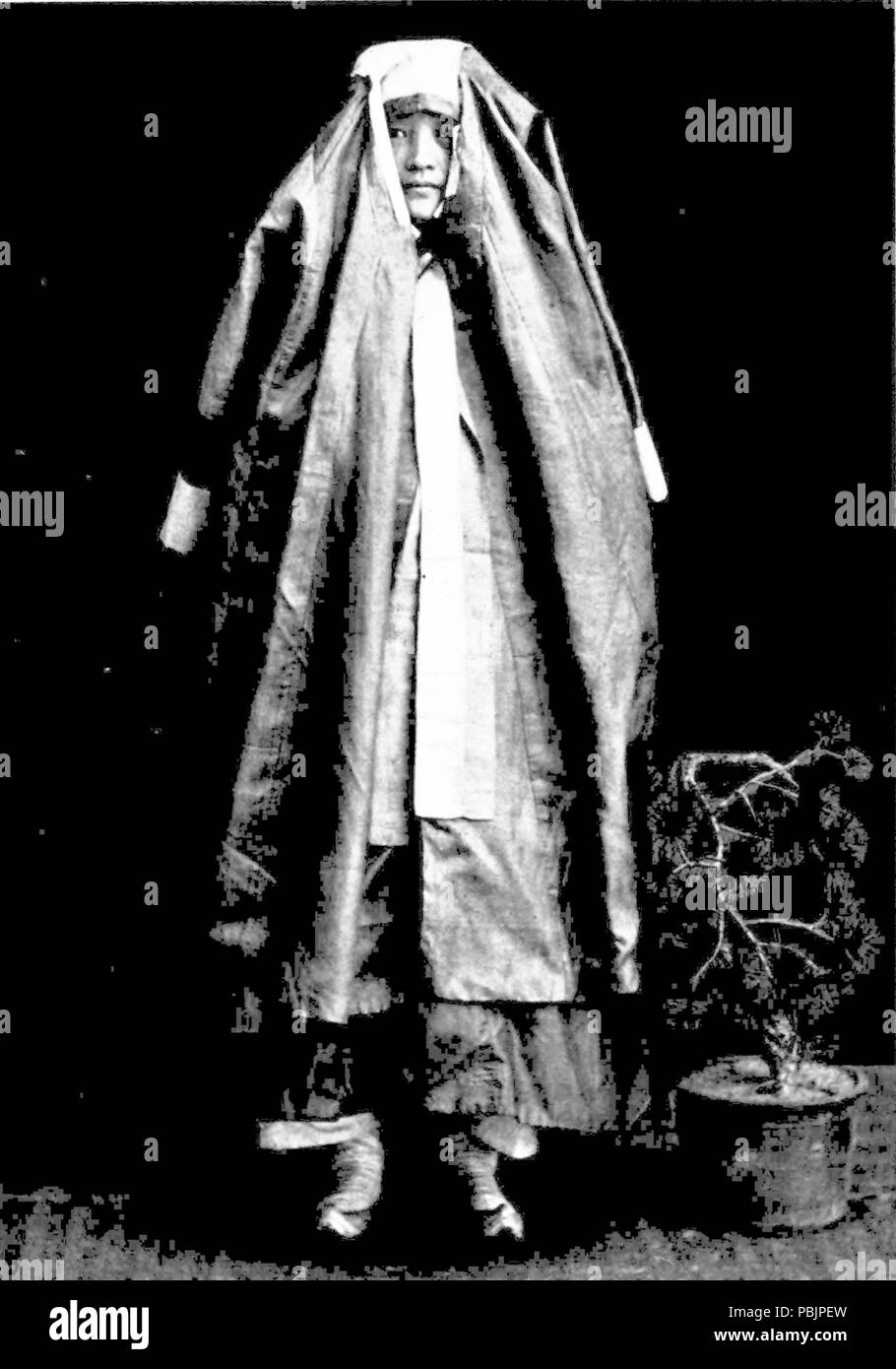 1865, rue de la femme costume correct Banque D'Images