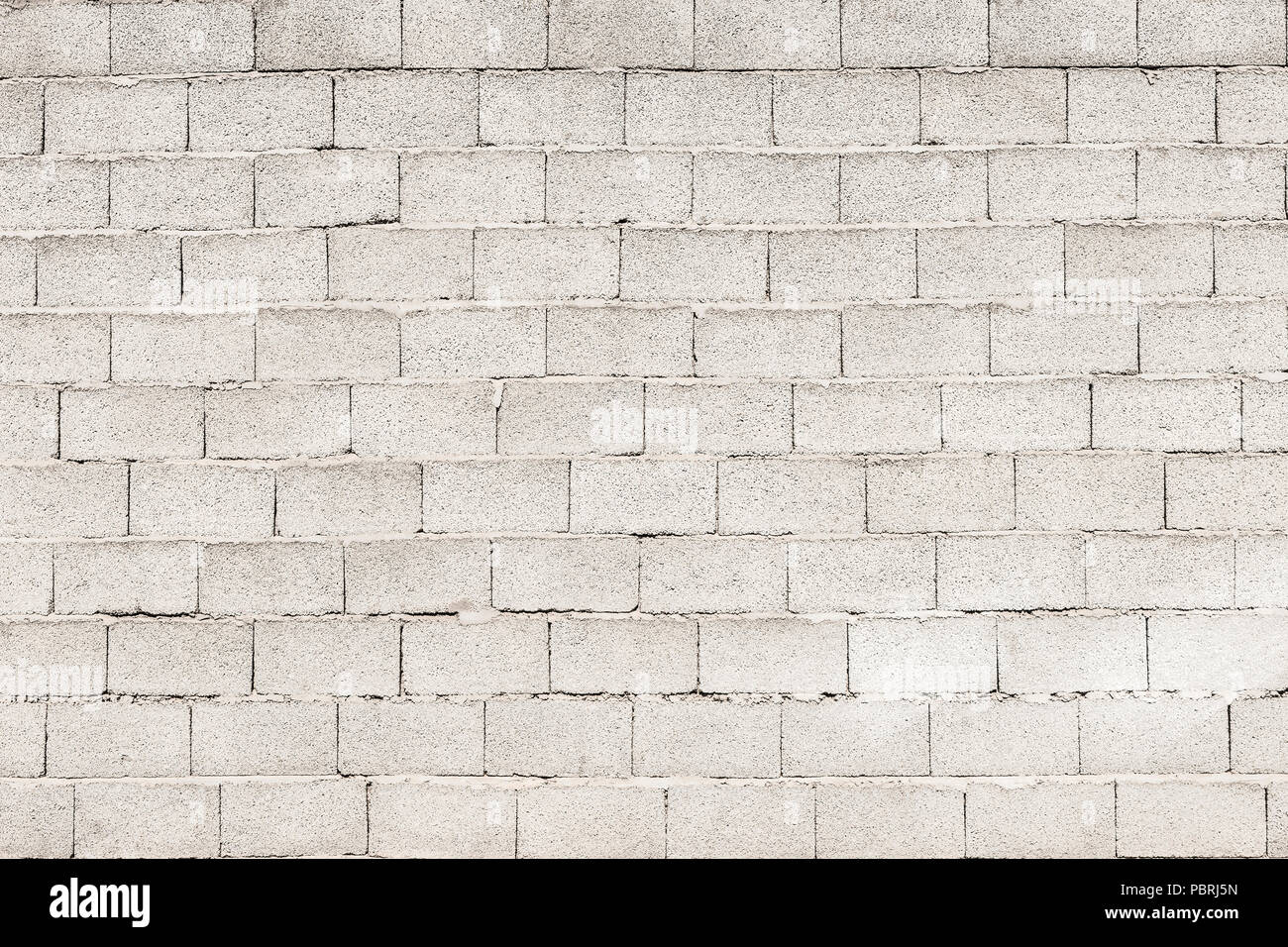 Mur en brique d'argile gris de pierres, image d'arrière-plan Banque D'Images