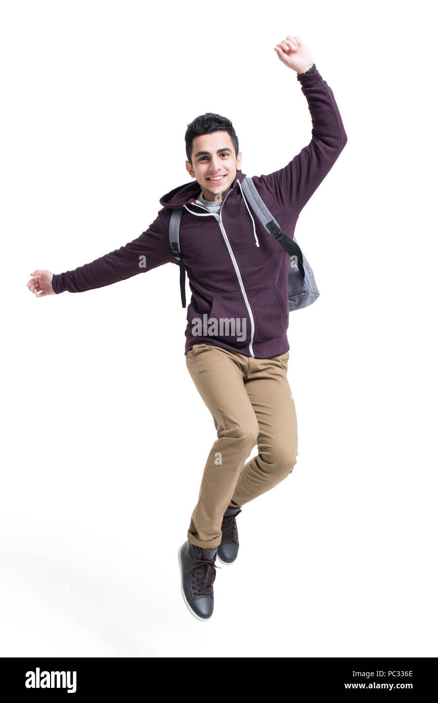 Homme gai étudiant étranger sautant Banque D'Images