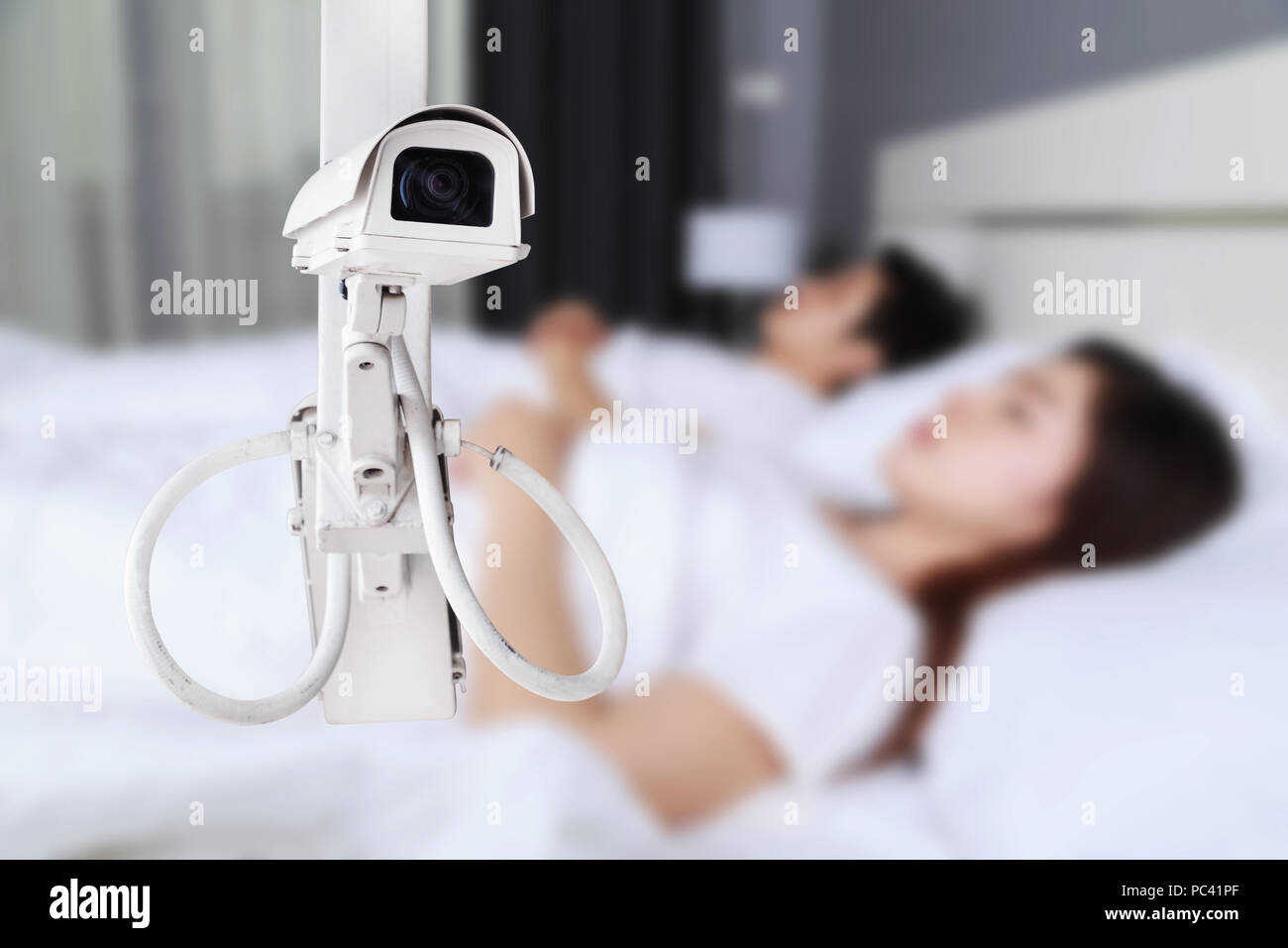 Caméra de surveillance ou de surveillance avec couple dans la chambre Photo  Stock - Alamy