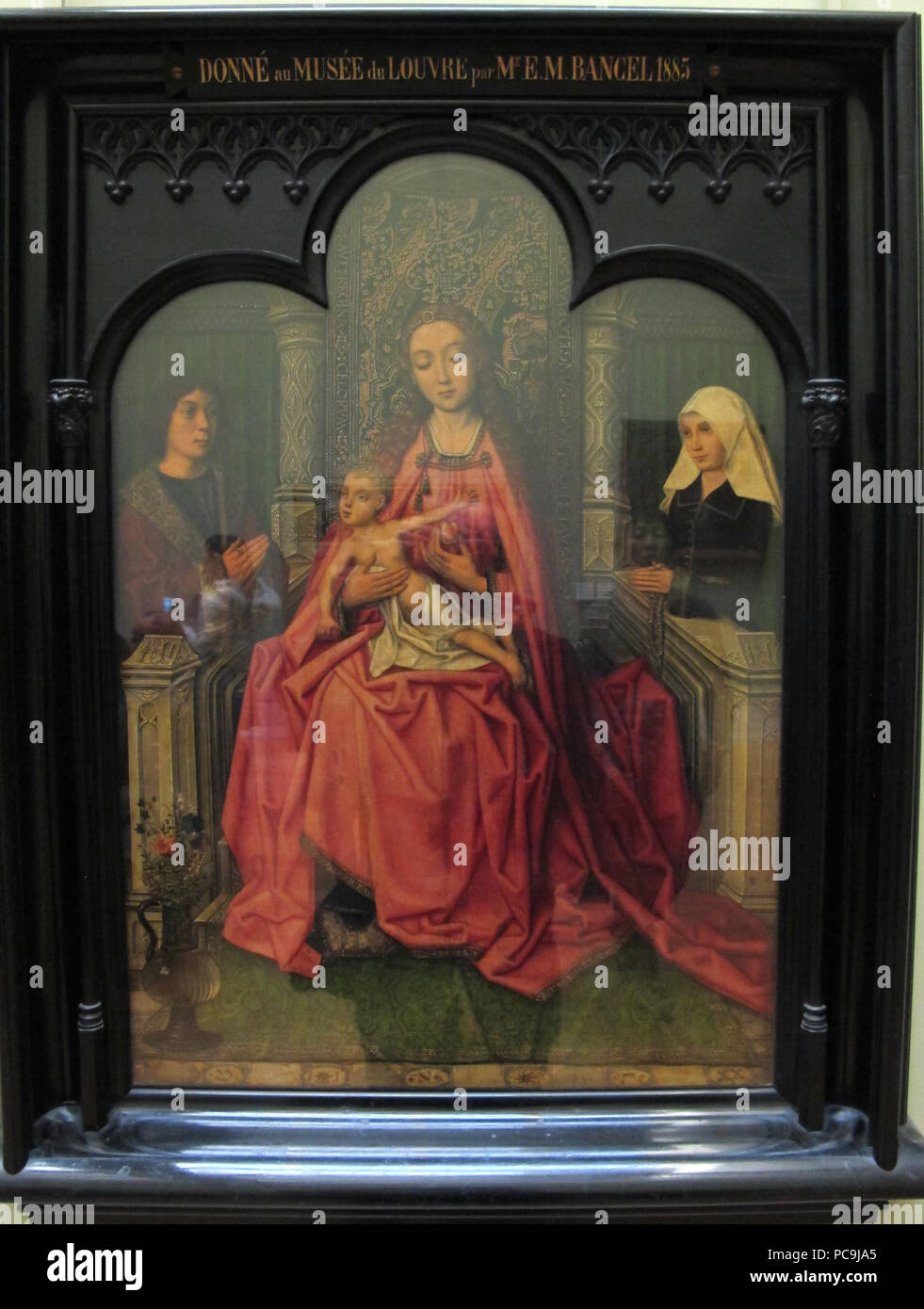 386 Maestro del 1499, Madonna col bambino e una coppia dans dimora, 1490 Banque D'Images