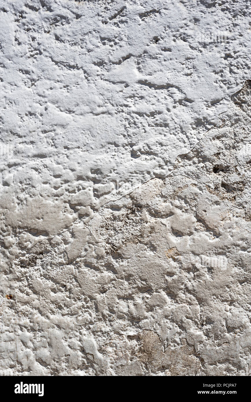 Texture de fond d'un mur en stuc blanc avec l'usure Banque D'Images