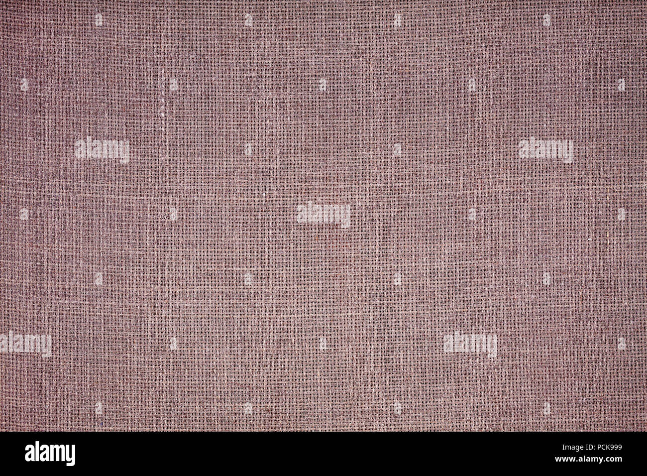 Les tons de couleur photo d'un lin naturel, à la texture ou à l'arrière-plan. Banque D'Images