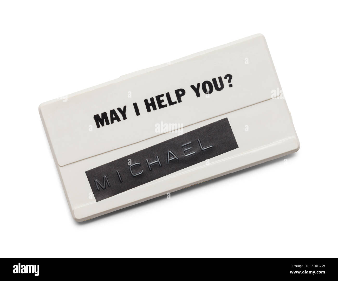Ancienne étiquette de nom en plastique isolé sur un fond blanc. Banque D'Images