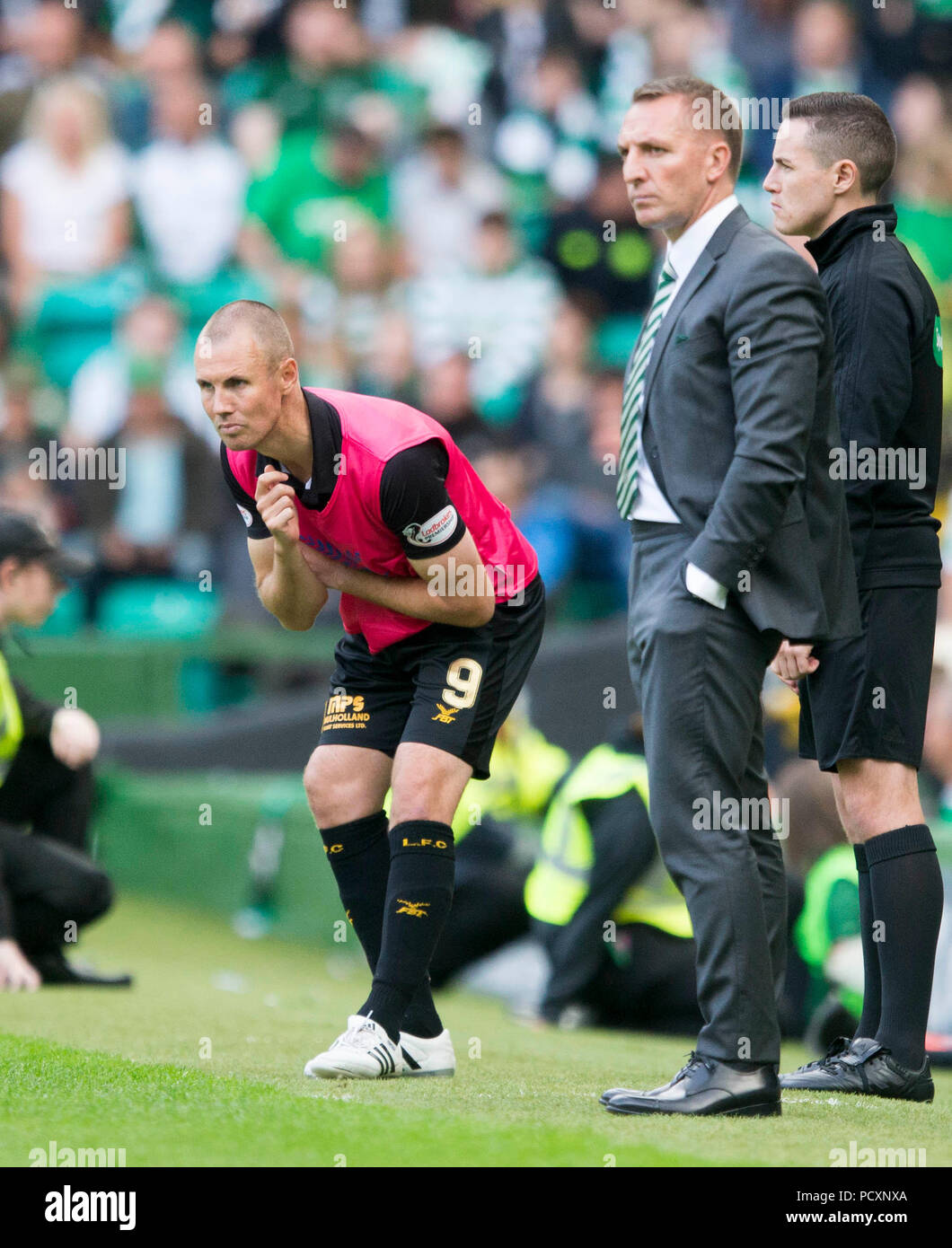 Livingston dvd/manager Kenny Miller (à gauche) et le Celtic manager Brendan Rodgers au cours de la Scottish Premiership match Ladbrokes au Celtic Park, Glasgow. Banque D'Images