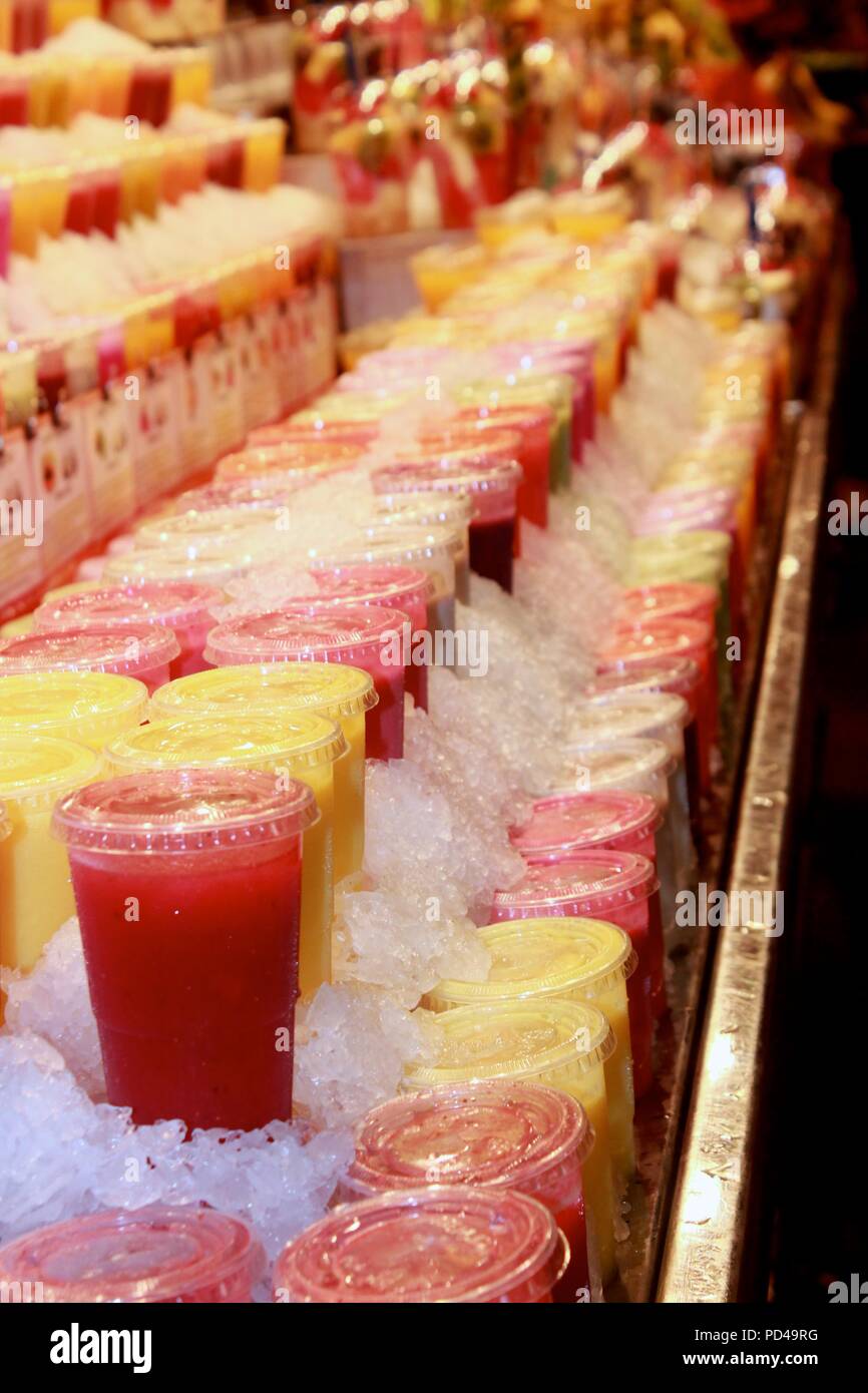 Jus de fruits au marché de Barcelone Banque D'Images