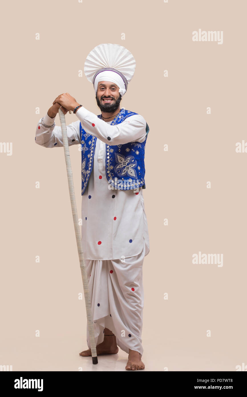Comité permanent de l'homme sikh avec Stick Banque D'Images Comité permanent de l'homme sikh avec Stick Banque D'Images