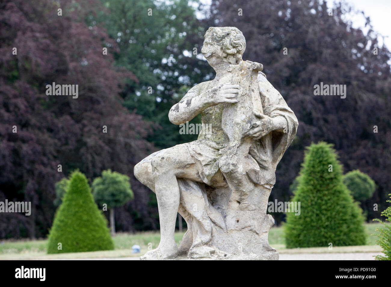 Un joueur de lyre baroque, sculpture à douves Nordkirchen Palace, Allemagne Banque D'Images