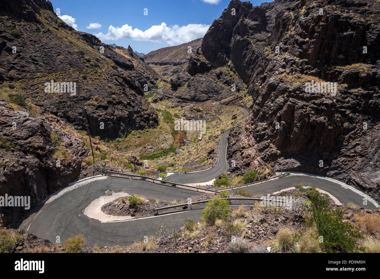 La serpentine, route de montagne sinueuse GC210, Barranco de la aldea, Gran Canaria, Îles Canaries, Espagne Banque D'Images