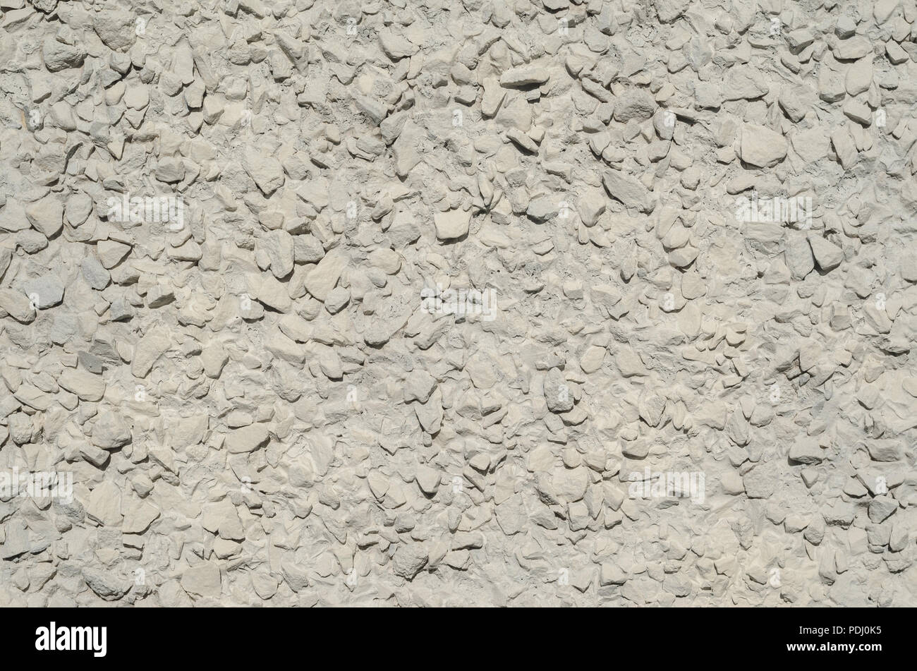 La texture du mur de plâtre de galets Banque D'Images