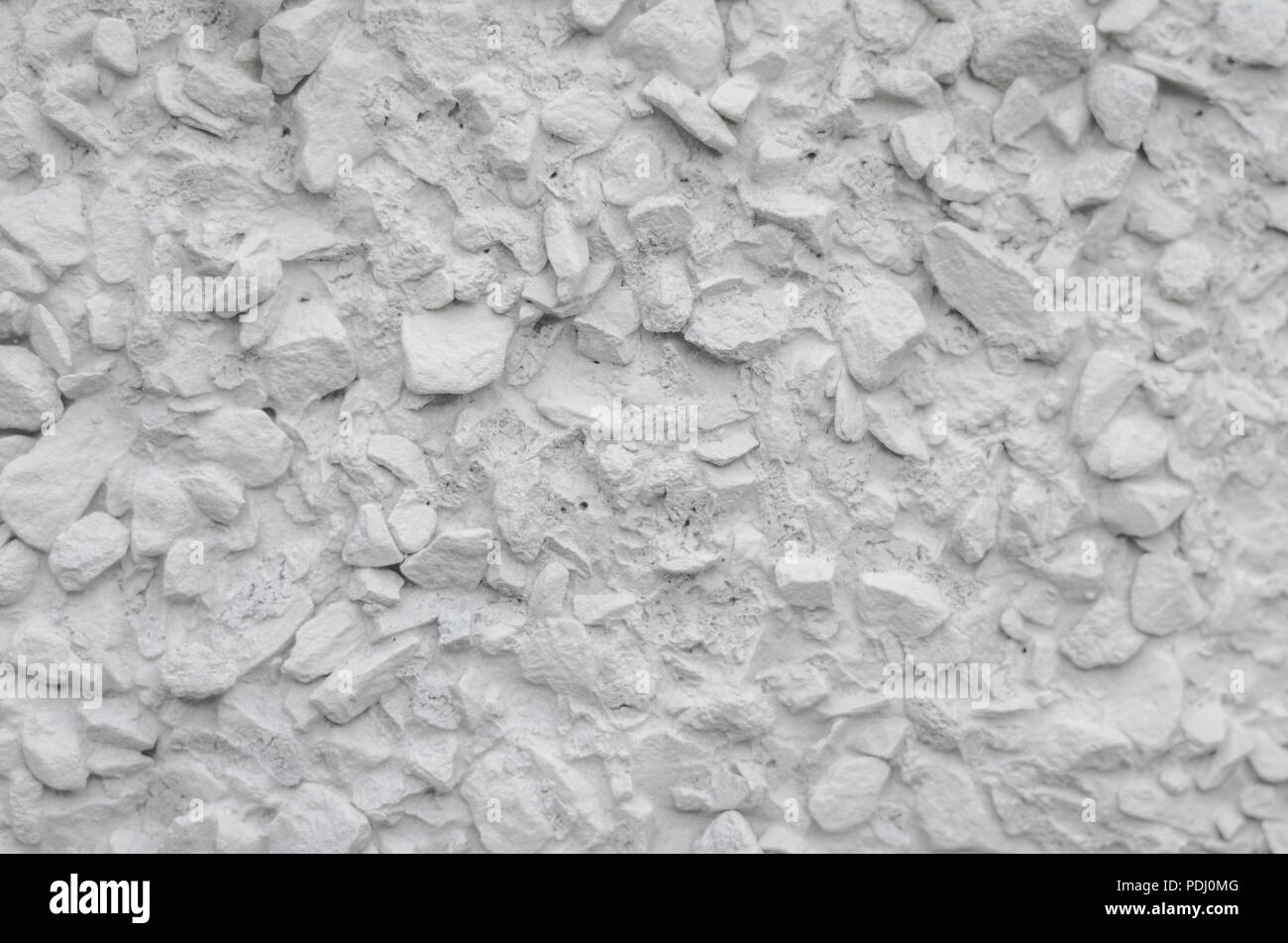 La texture du mur de plâtre de galets Banque D'Images