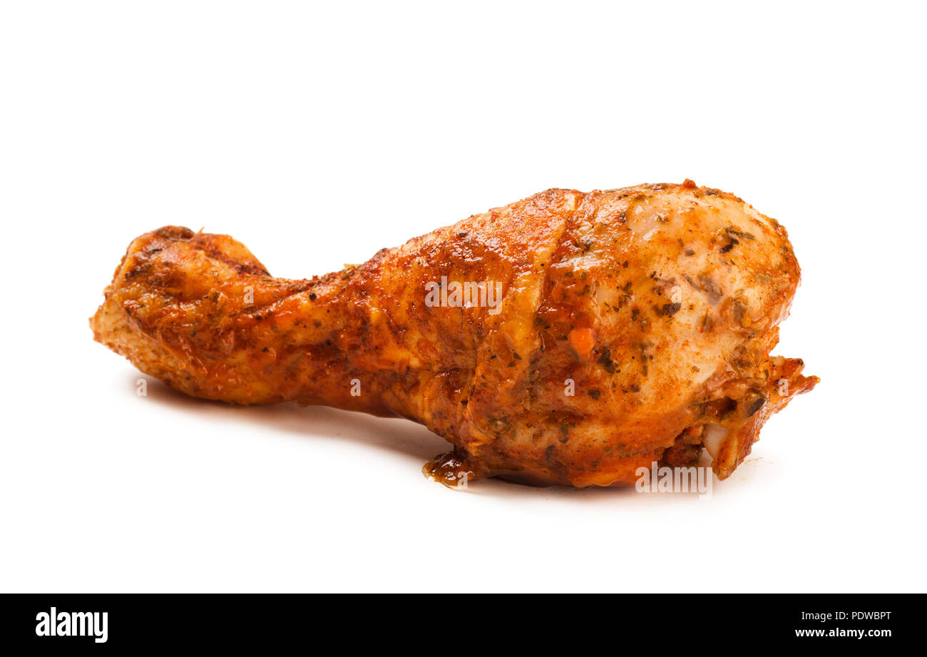 La jambe de poulet en sauce sur le livre blanc fond isolé Banque D'Images