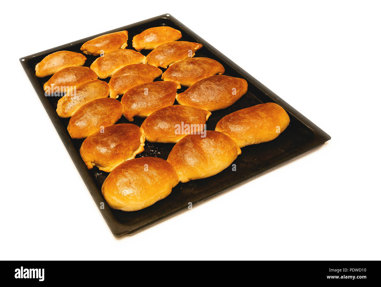 Petits pains chauds sur la plaque de cuisson Banque D'Images