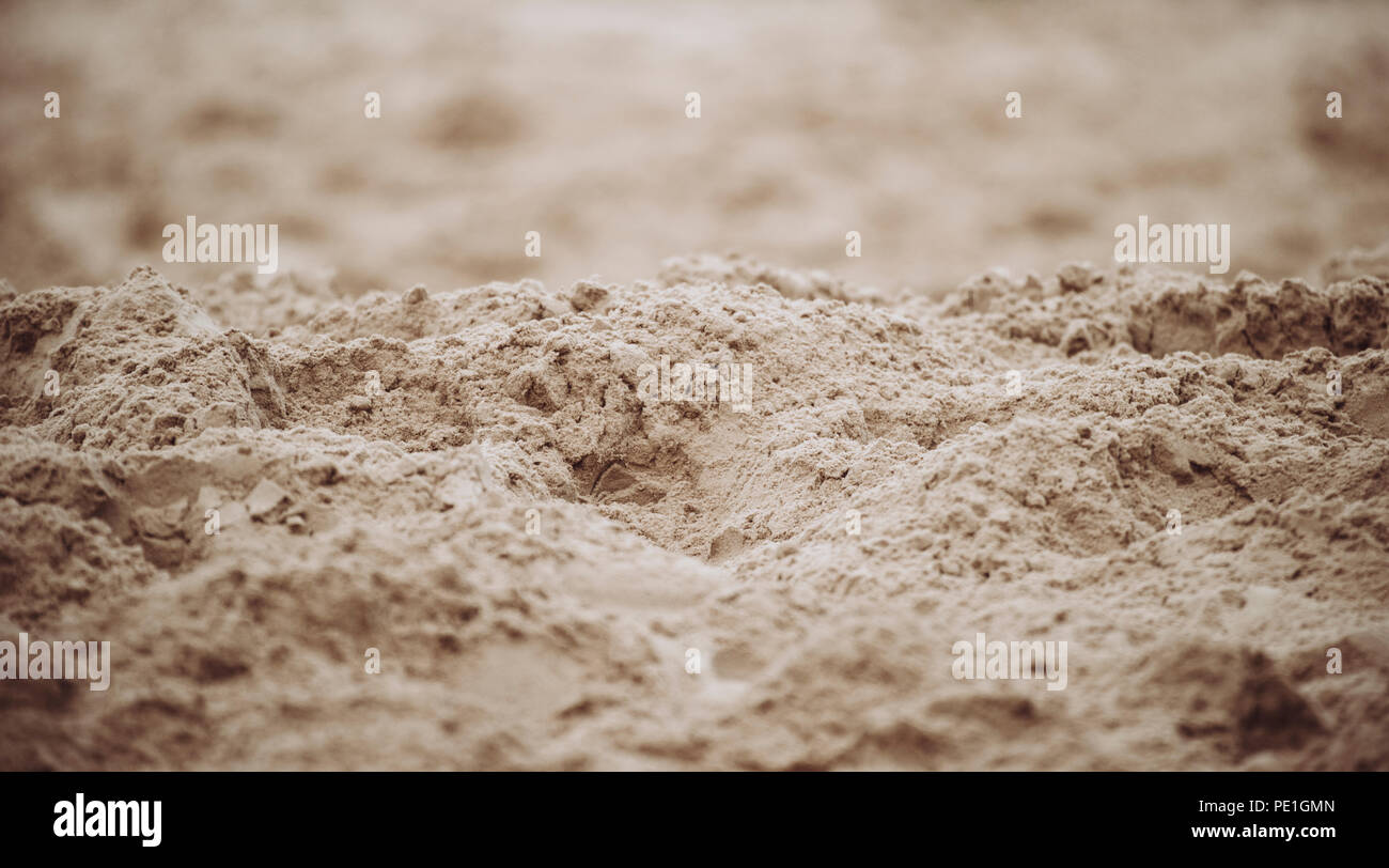 Gros plan du motif de sable d'une plage en été Banque D'Images
