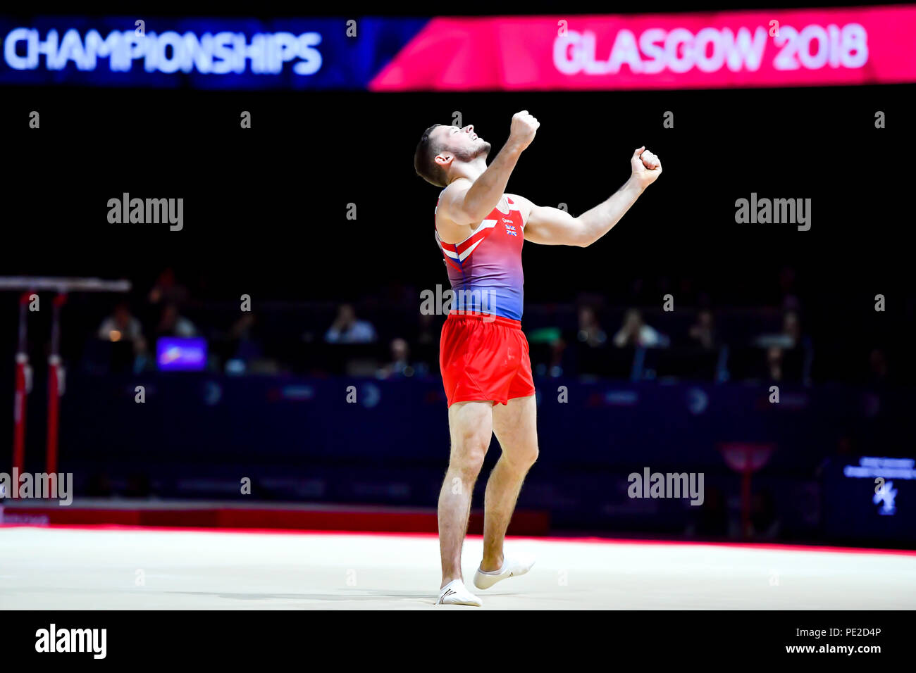 Glasgow, Ecosse, Royaume-Uni. 12 août 2018. Dominick CUNNINGHAM (GBR) célèbre après l'exercice au sol en gymnastique artistique masculine pendant la finale de l'appareil European Championships 2018 Glasgow à l'Hydro SSE le dimanche, 12 août 2018. GLASGOW EN ÉCOSSE. Credit : Crédit : Wu G Taka Taka Wu/Alamy Live News Banque D'Images