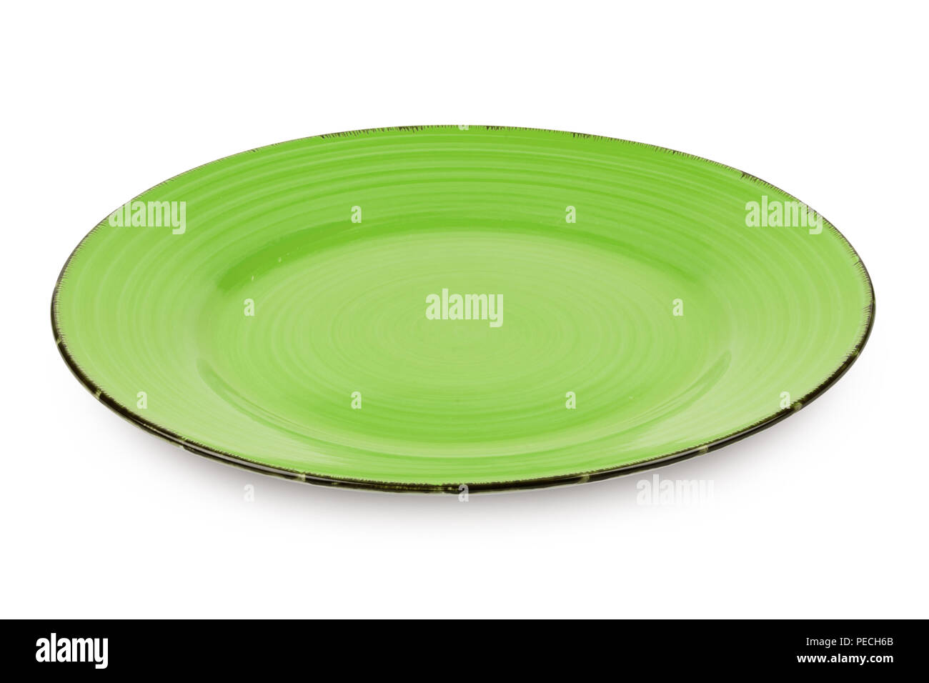 Assiette verte isolée sur fond blanc avec clipping path Banque D'Images