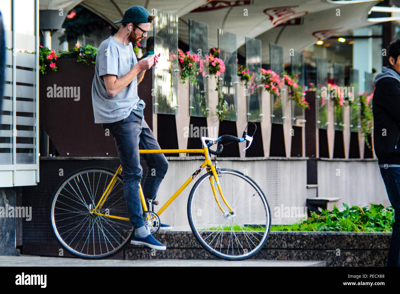 yellow fixed gear bike