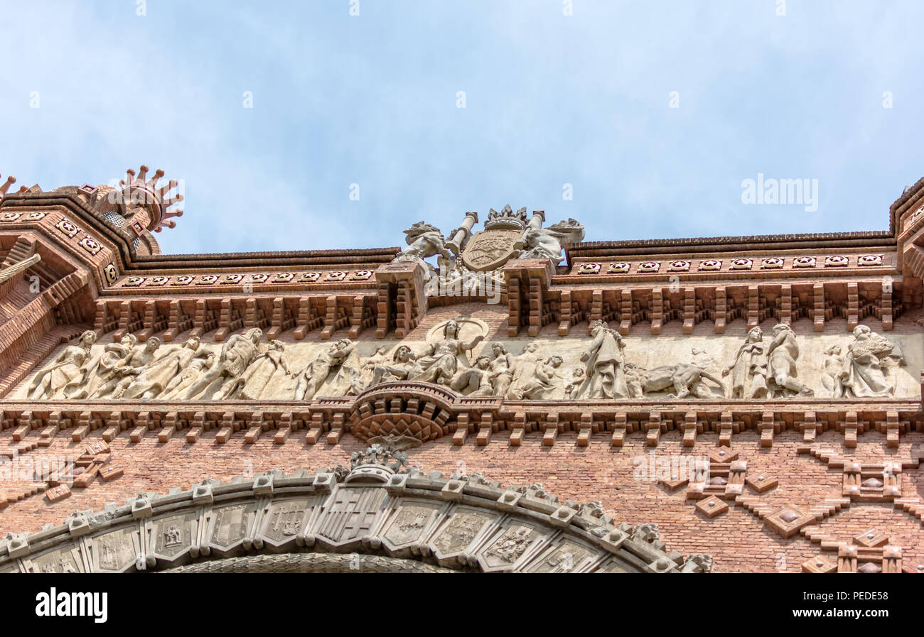 Intitulé frise Recompensa ("récompense") sur l'Arc de Triomf (Arc de Triomphe) à Barcelone, Espagne. Banque D'Images