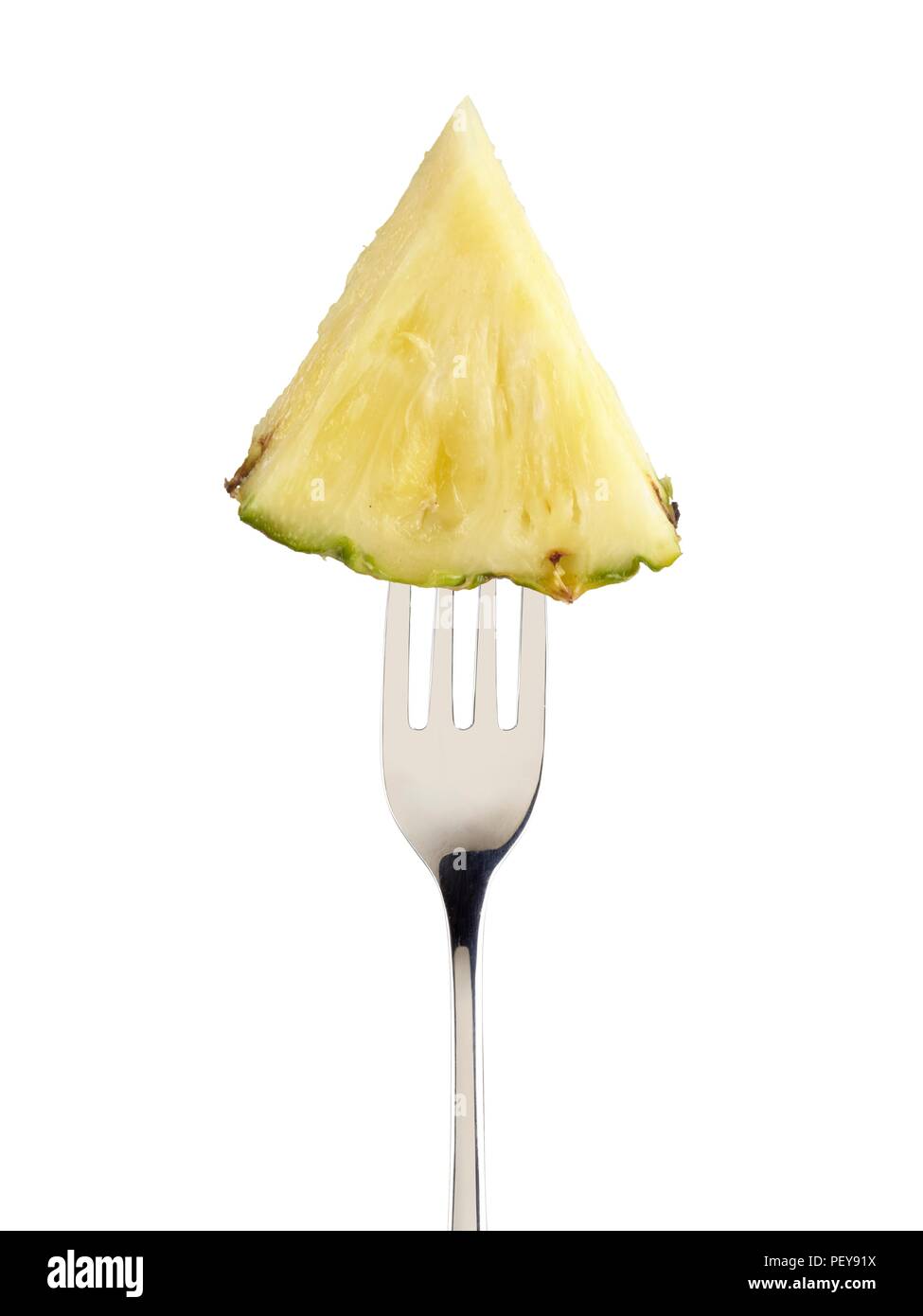 Tranche d'ananas sur une fourchette. Banque D'Images