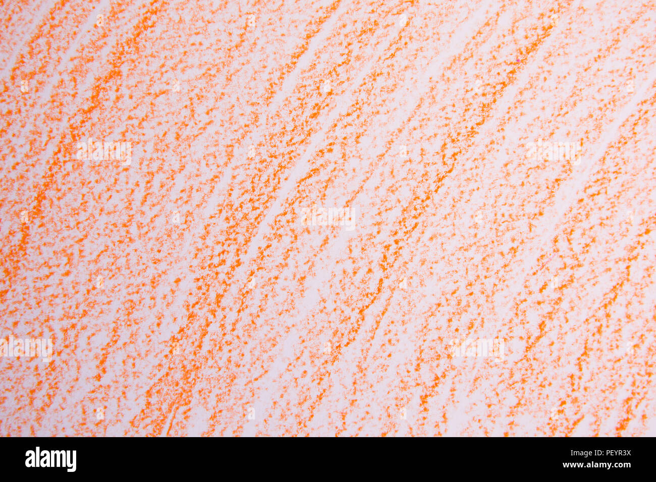 Crayon de cire Orange scribble arrière-plan. La texture des crayons de couleur orange. Banque D'Images