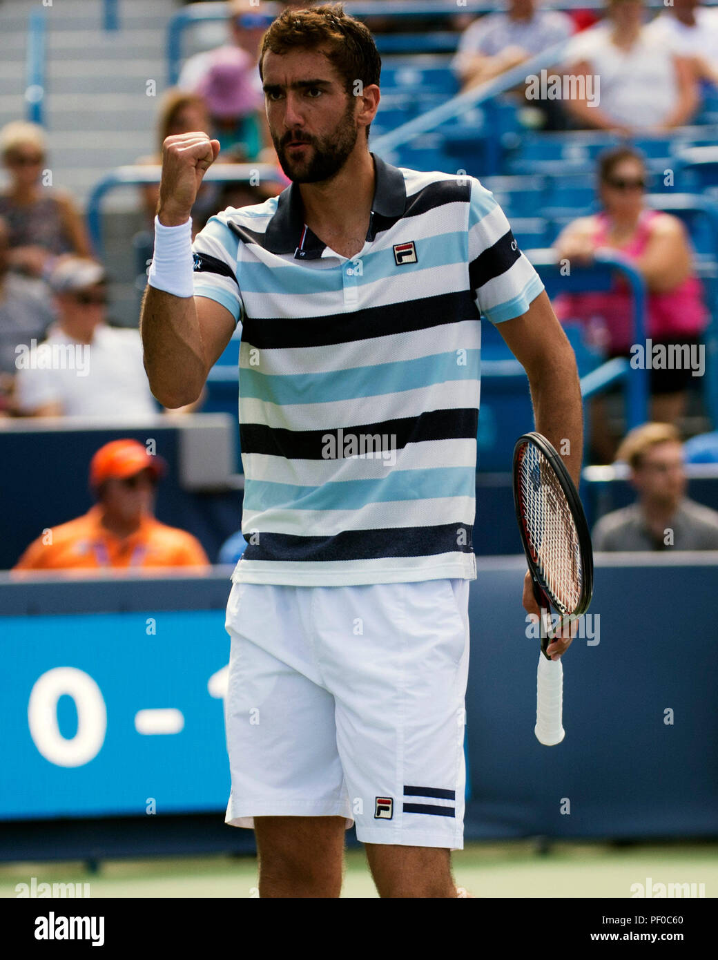 Ohio, États-Unis. 18 août 2018. Marin Cilic (CRO) célèbre un point contre Novak Djokovic (SRB) à l'Open Western Southern à Mason, Ohio, États-Unis. Brent Clark/Alamy Live News Banque D'Images